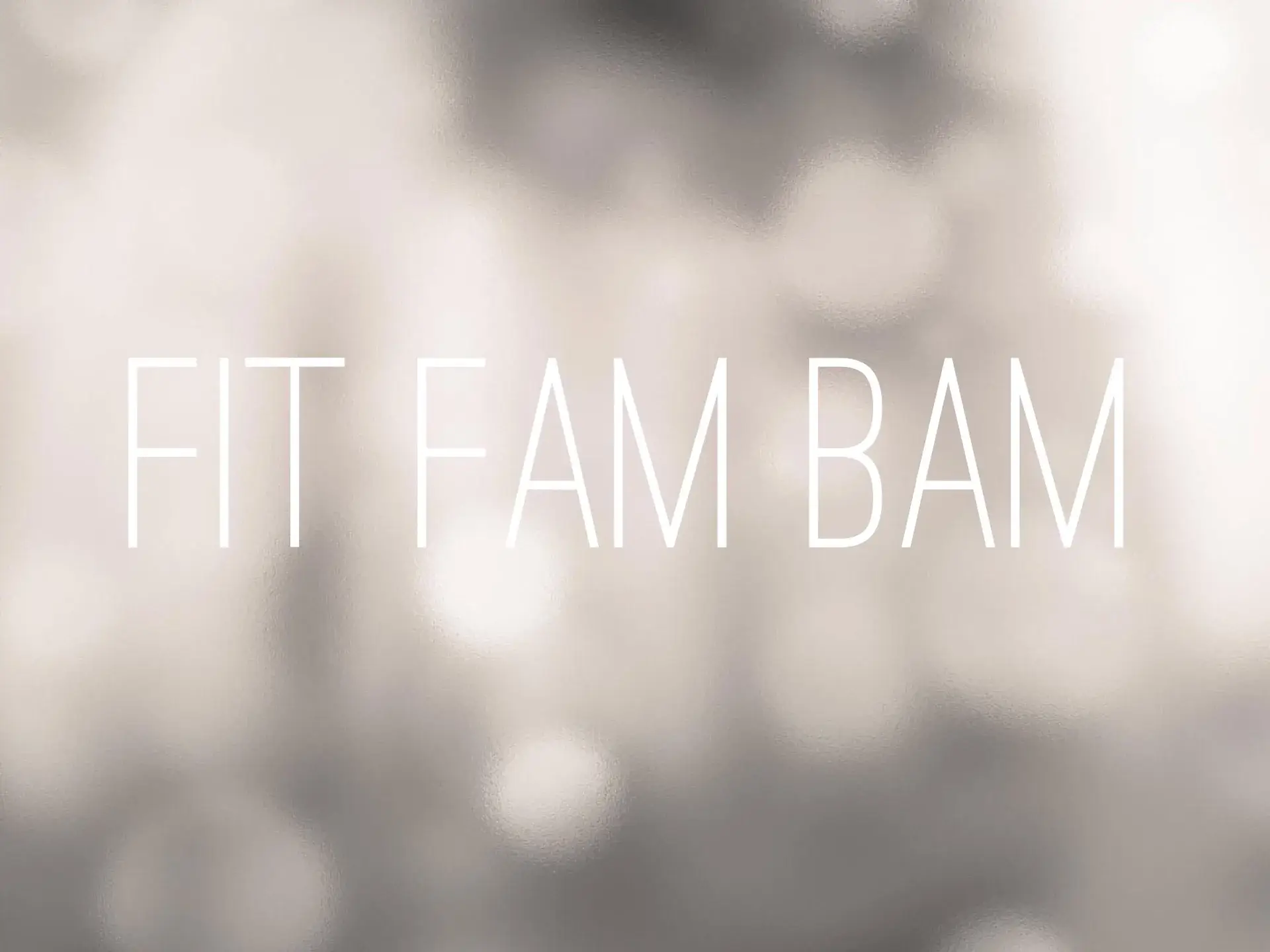 The 2015 FitFamBam wordmark, type over a bokeh photograph